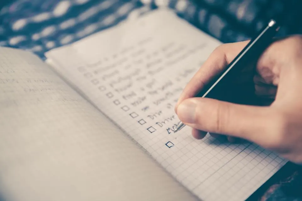 Notebook with a handwritten checklist